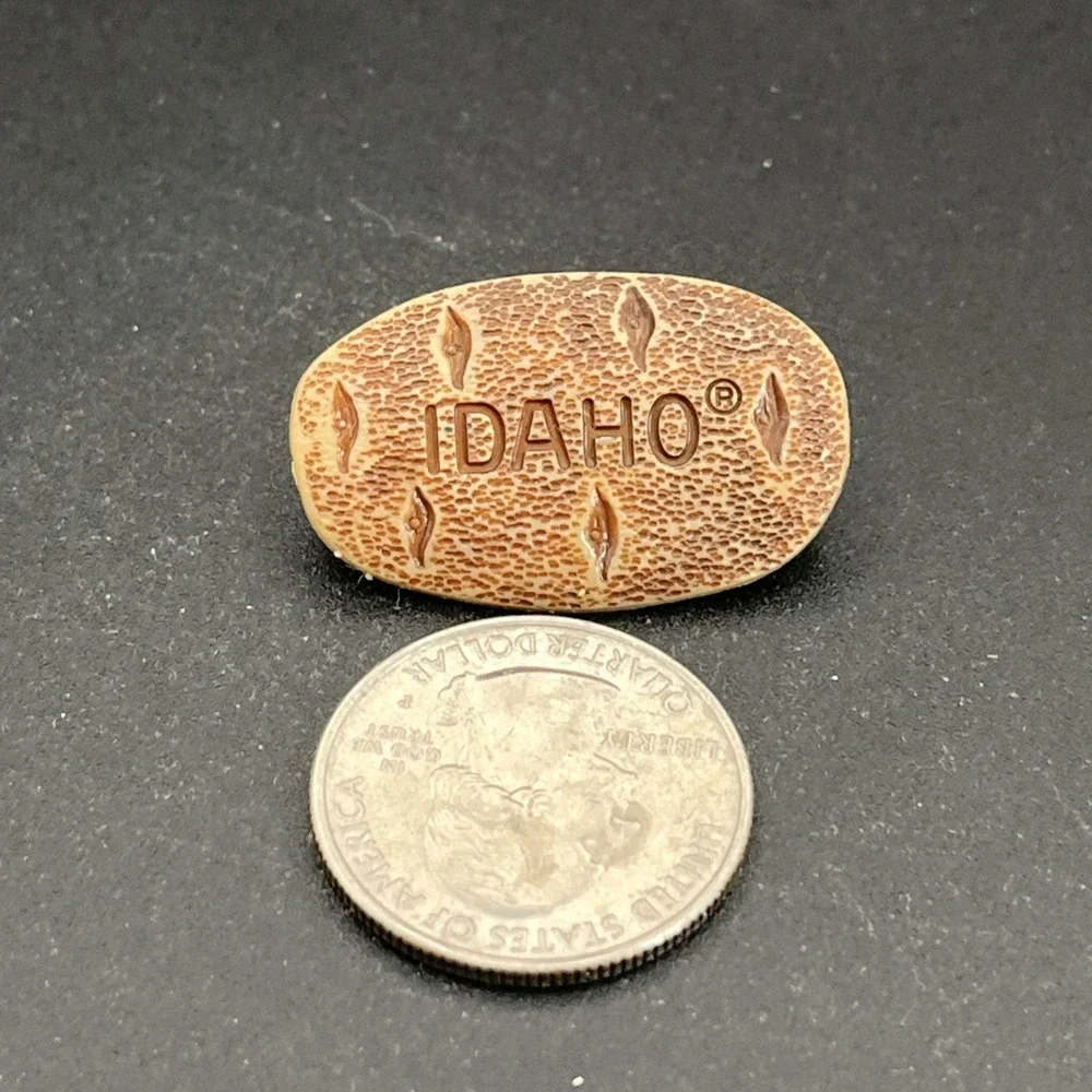 Vintage Idaho Potato Plastic Lapel‎ Hat Pin B4